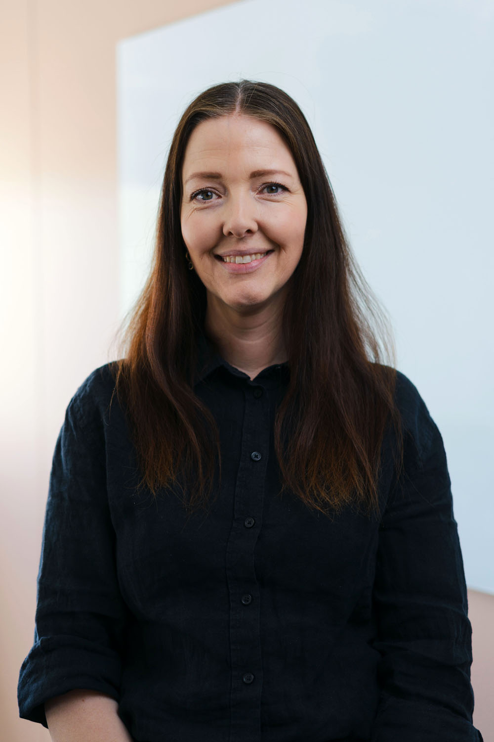 Portrait format workplace photo for Conta