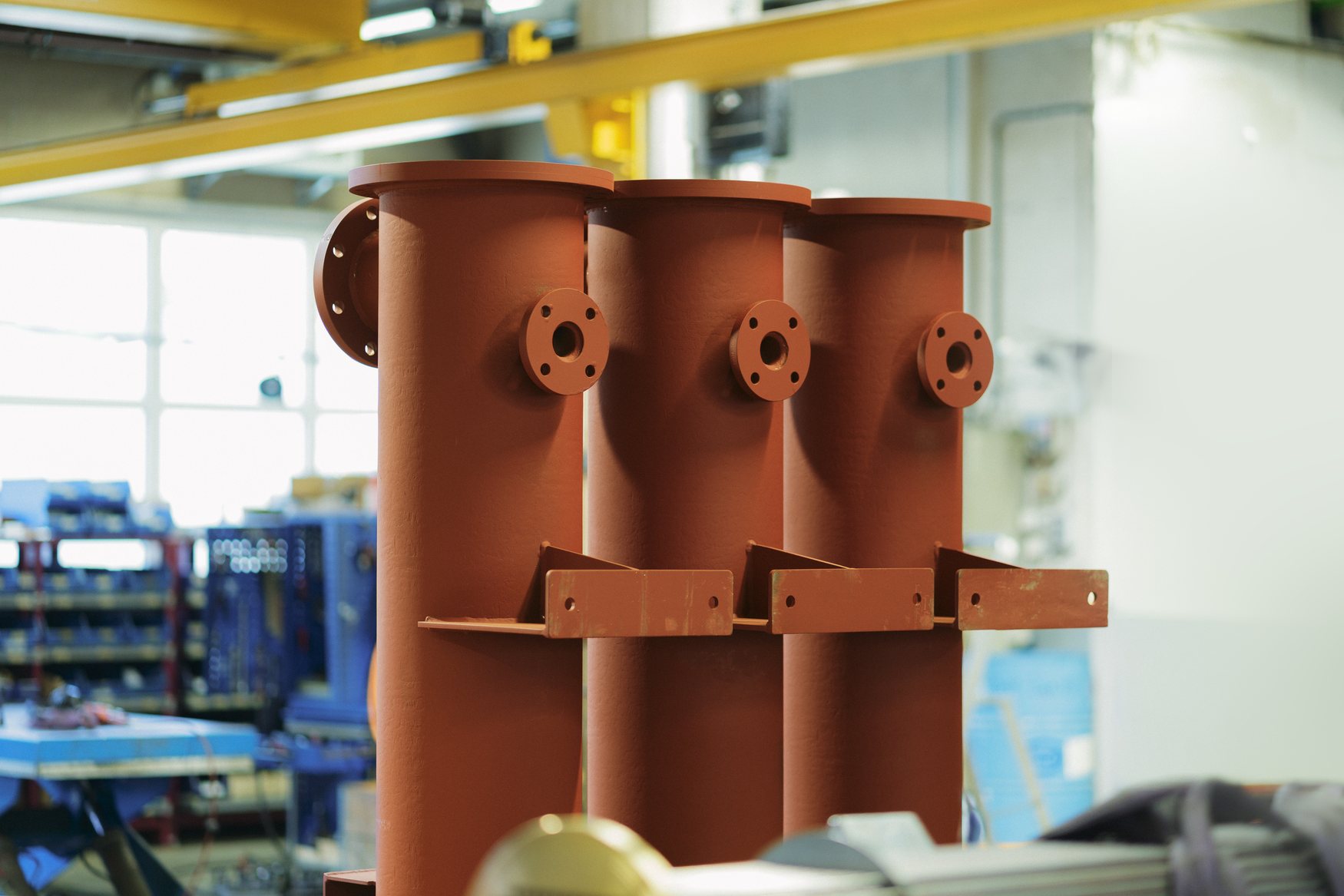 Primed heat exchanger shells with flanges in the workshop