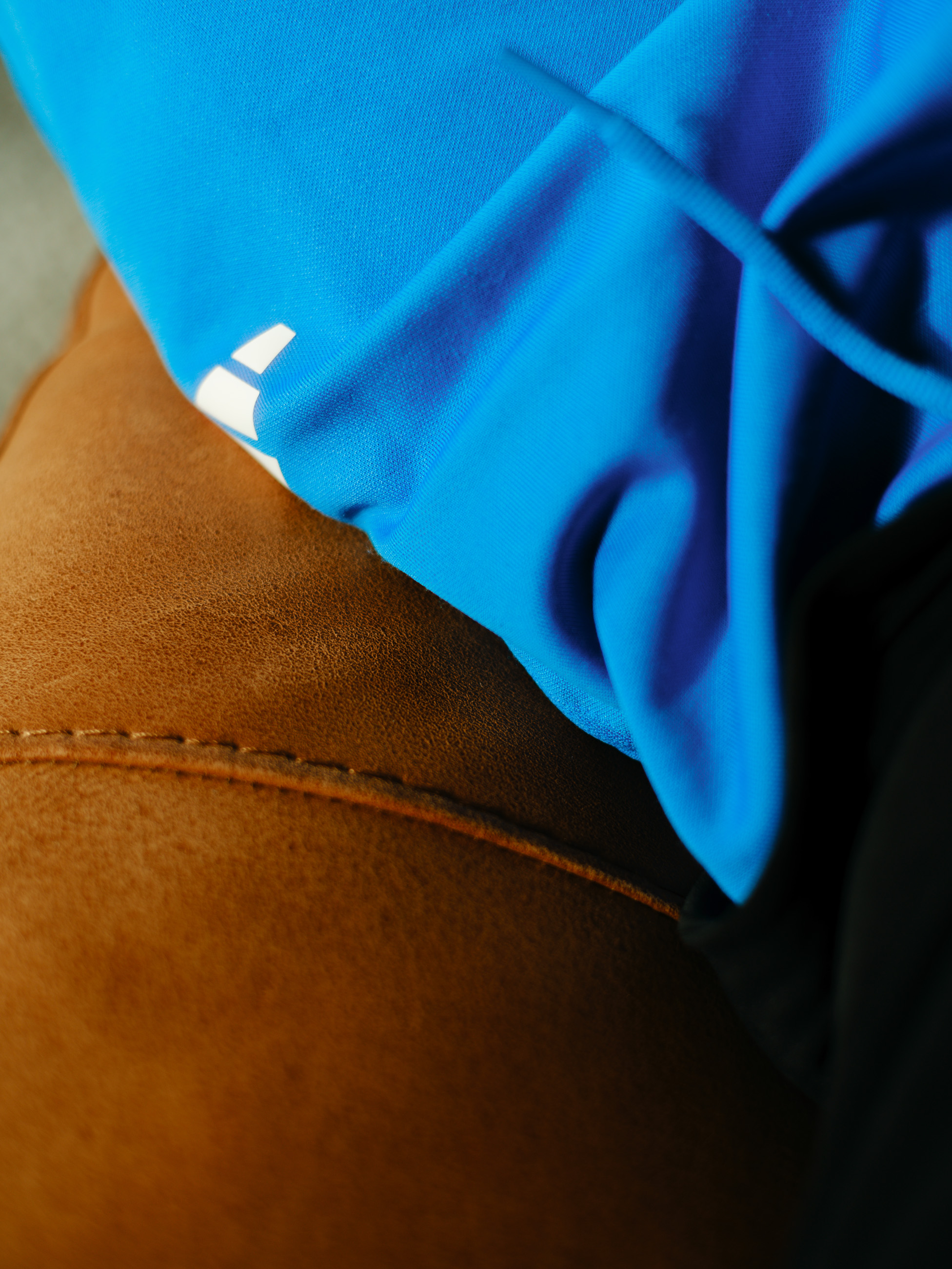 Blue fabric and leather detail